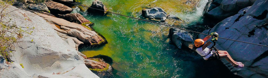 Challenge Yourself to a Zipline Canopy Tour or Adventure Park