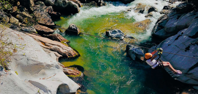 Challenge Yourself to a Zipline Canopy Tour or Adventure Park